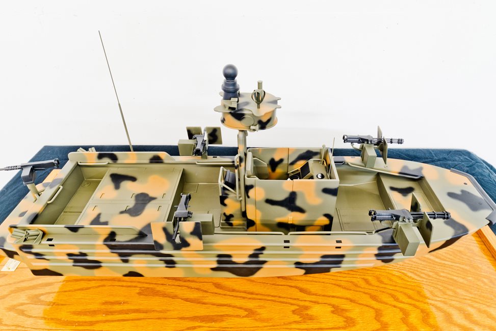 scale model of camoflauge military watercraft