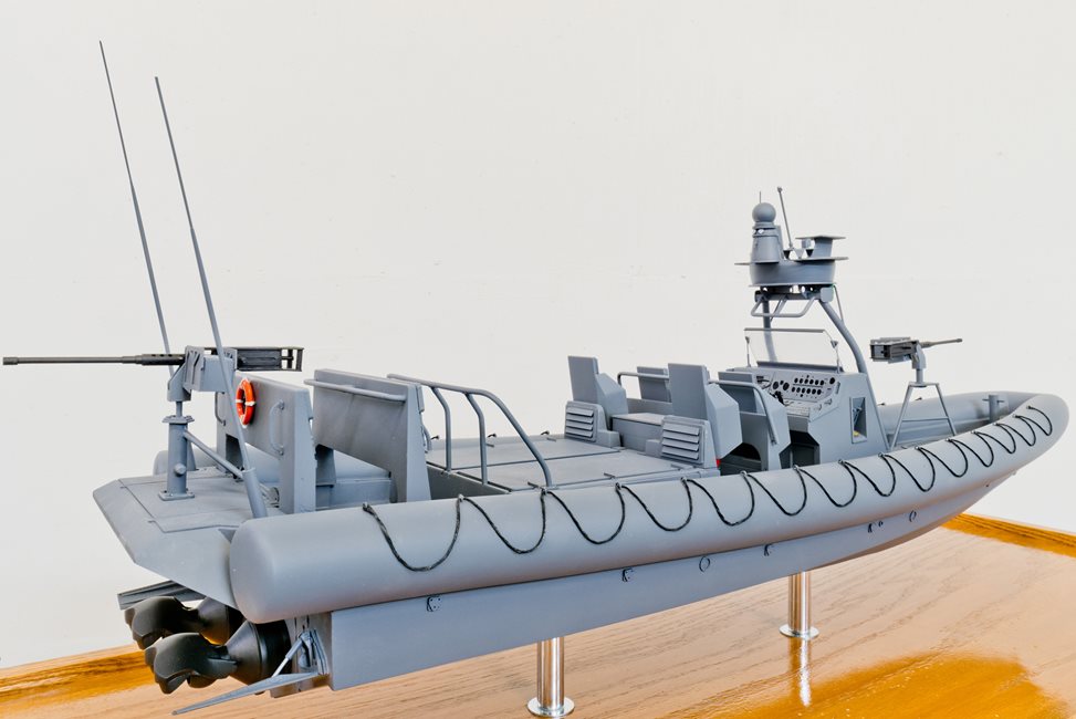 scale model of gray boat